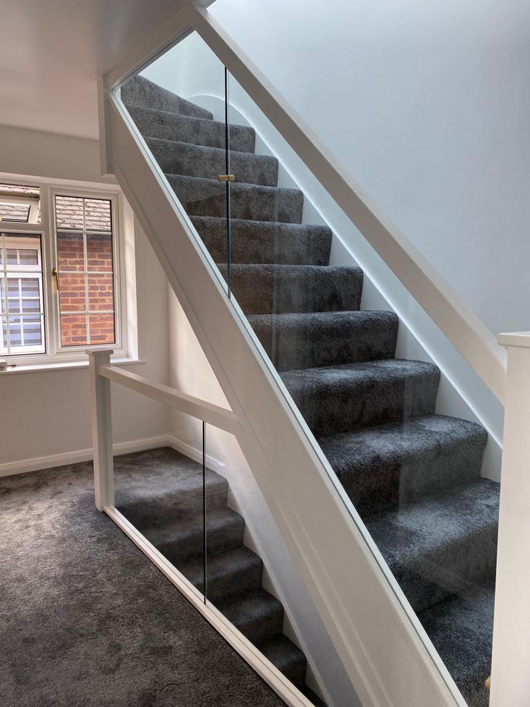 A set of stairs to a newly converted loft